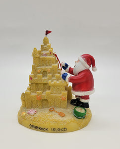 SI Santa Building a Sand Castle