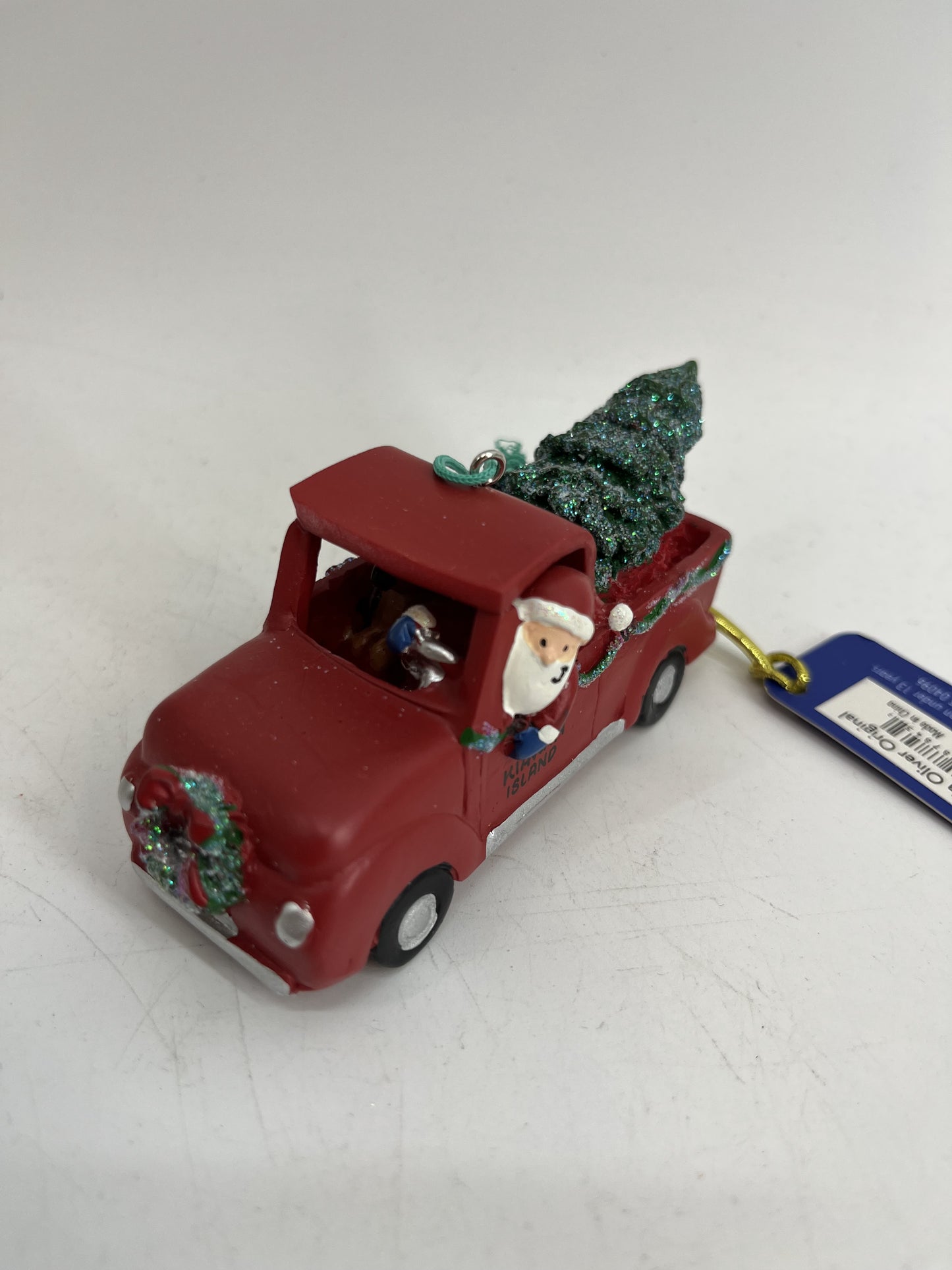 KI Santa in Red Pickup Truck