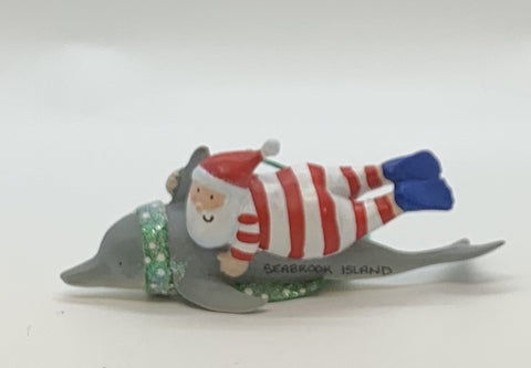 SI Santa Swimming with Dolphin